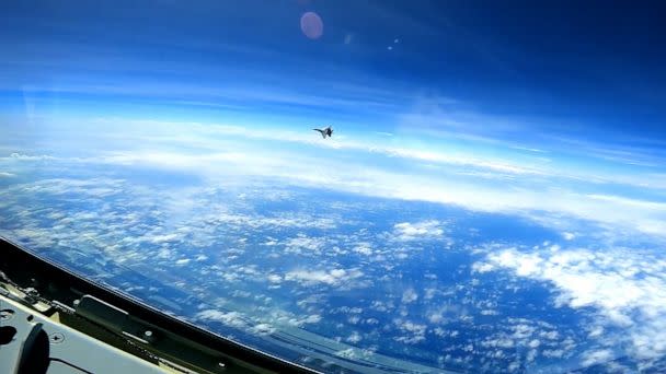 PHOTO: A People's Republic of China J-16 fighter pilot performs a maneuver during the intercept of a U.S. Air Force RC-135 aircraft over the South China Sea, May 26, 2023. (USAF)