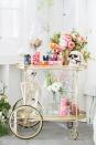 <p>Decorate your table with skulls, spiderwebs, then fill jars with candy. Is it weird that we think this looks insanely chic? Get the tutorial at <a href="https://sugarandcharm.com/2016/10/perfect-halloween-candy-cart.html?section-15" rel="nofollow noopener" target="_blank" data-ylk="slk:Sugar and Charm;elm:context_link;itc:0;sec:content-canvas" class="link ">Sugar and Charm</a>.</p><p><a class="link " href="https://www.amazon.com/Halloween-Skeletons-Decorations-Posable-Joints/dp/B07FJPVFN6/?tag=syn-yahoo-20&ascsubtag=%5Bartid%7C10057.g.2554%5Bsrc%7Cyahoo-us" rel="nofollow noopener" target="_blank" data-ylk="slk:BUY NOW;elm:context_link;itc:0;sec:content-canvas">BUY NOW</a> <em><strong>Poseable Halloween Skeletons, $15</strong></em></p>