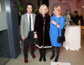 <p>The Duchess of Cornwall wore a raspberry velvet coat dress and large stone drop earrings to a reception to launch the "Glorious Grandparents" initiative in London. </p>