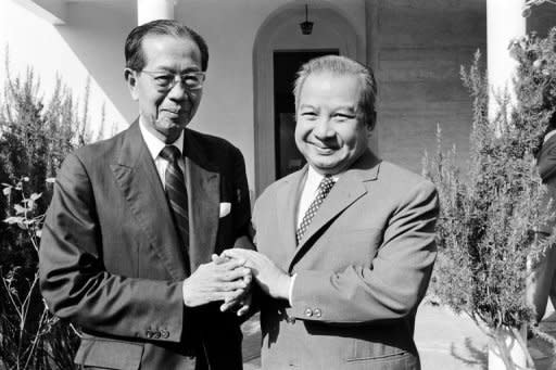 Prince Norodom Sihanouk of Cambodia (R) shakes hand with his former prime minister Son Sann on August 3, 1981 at Mougins, southern France. Cambodia's revered ex-king Sihanouk, whose life encompassed turbulent years of rule, exile and war including the Khmer Rouge reign of terror, died Monday in China, sparking nationwide mourning