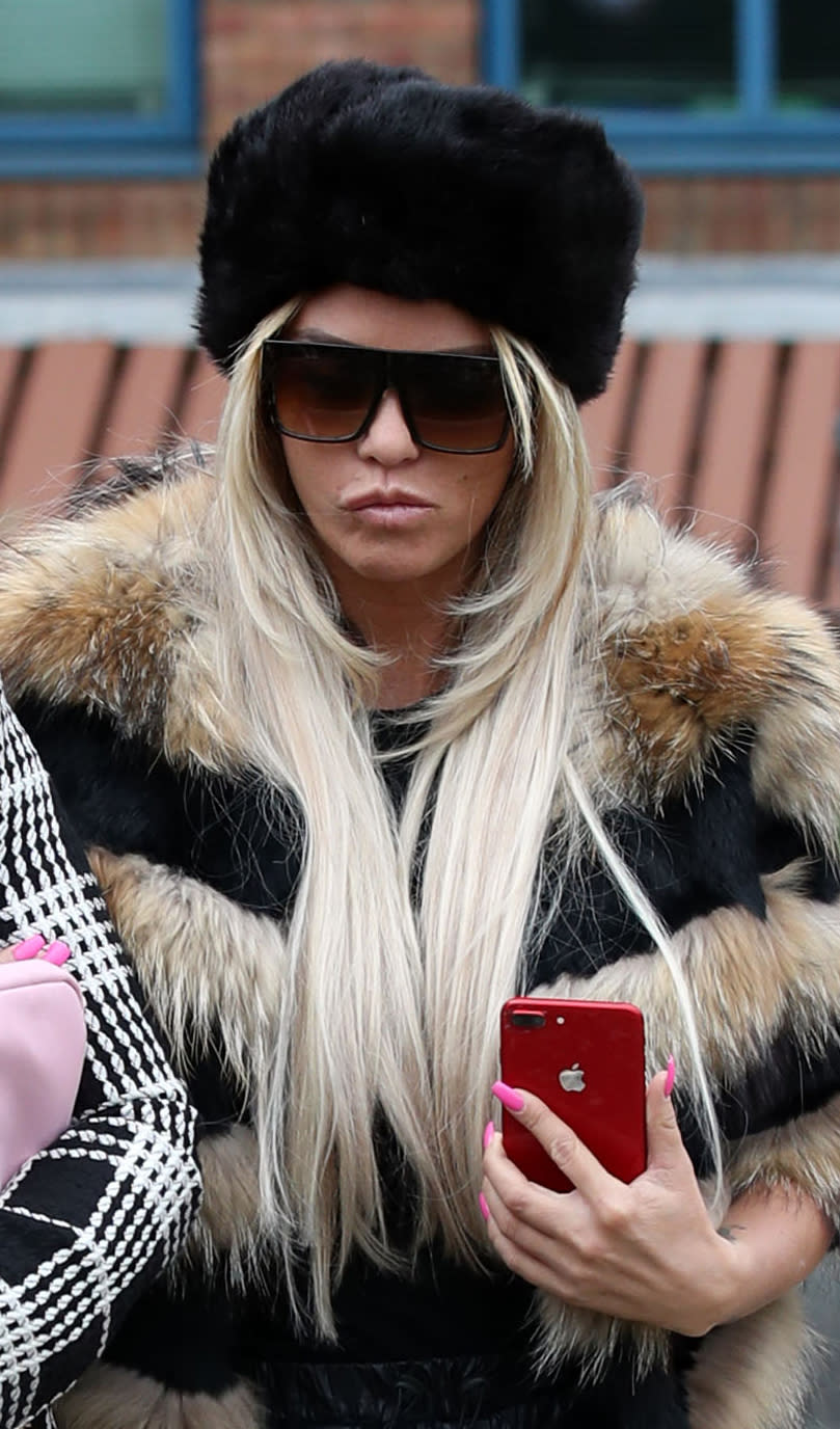 Katie Price arrives at Crawley Magistrates' Court where she faces two counts of using threatening, abusive, words or behaviour to cause harassment, alarm or distress.