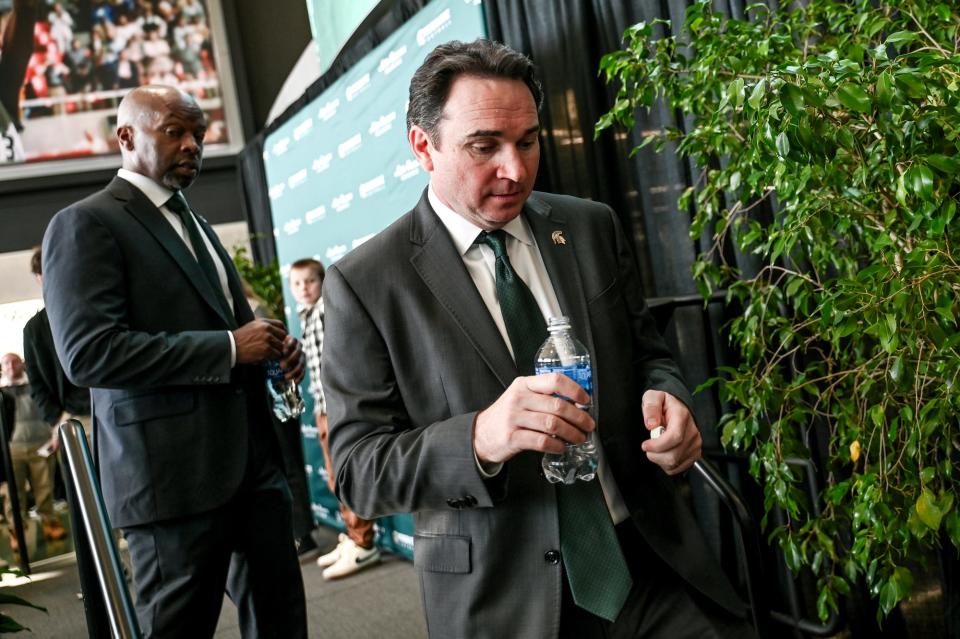 Michigan State football coach Jonathan Smith leaves the stage after speaking during an introductory press conference on Tuesday, Nov. 28, 2023, at the Breslin Center in East Lansing.