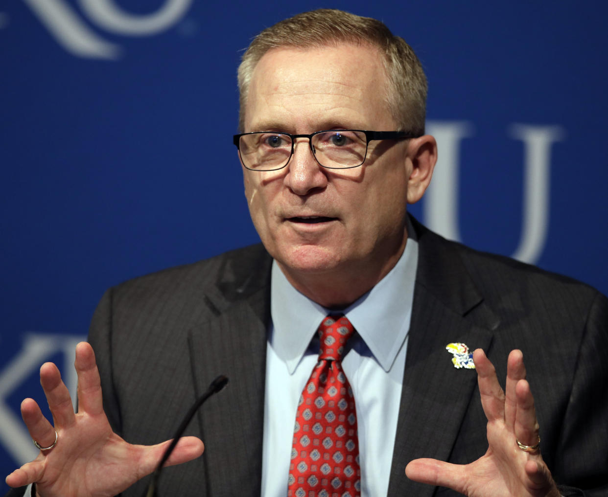 New Kansas athletic director Jeff Long answers questions during a news conference in Lawrence, Kan., Wednesday, July 11, 2018. (AP Photo/Orlin Wagner)