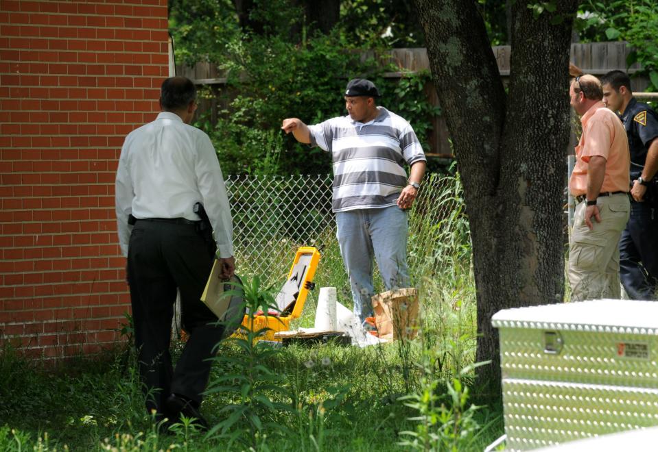 Homicide detectives and forensic crime scene technicians process the scene of a homicide at 334 Rhew Street on May 31, 2010. A former Fort Bragg soldier was arrested in Texas on Tuesday, Feb. 7, 2023, in the killing of Terrance Omar Plummer Jr.