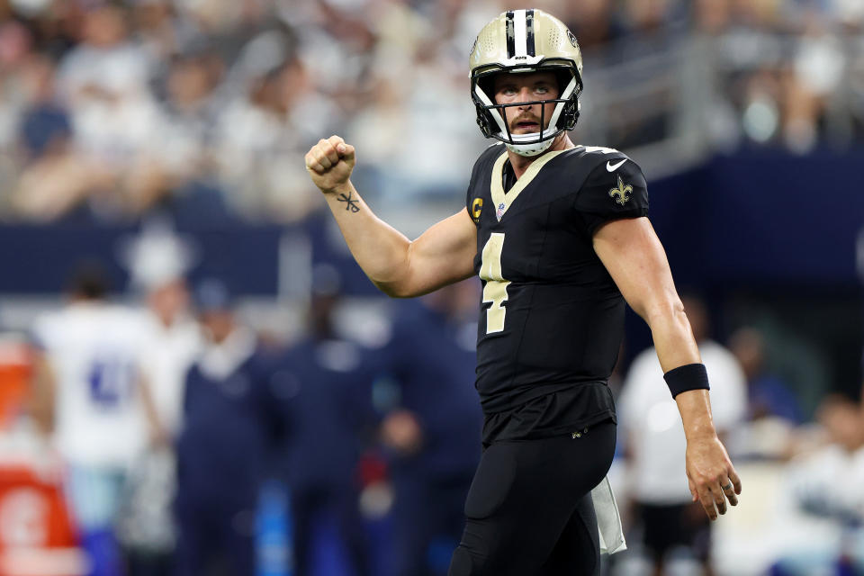 Derek Carr #4 of the New Orleans Saints celebrates a touchdown pass during the third quarter against the Dallas Cowboys at AT&T Stadium on September 15, 2024 in Arlington, Texas. (Photo by Ron Jenkins/Getty Images)