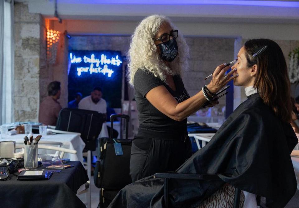 Lee touches up actress Patricia Gonzalez’s face. “It’s just been amazing – the journey,” Lee said. “The journey and just the love and the passion for still the science of skin and taking care of my clients.” Lauren Witte/lwitte@miamiherald.com