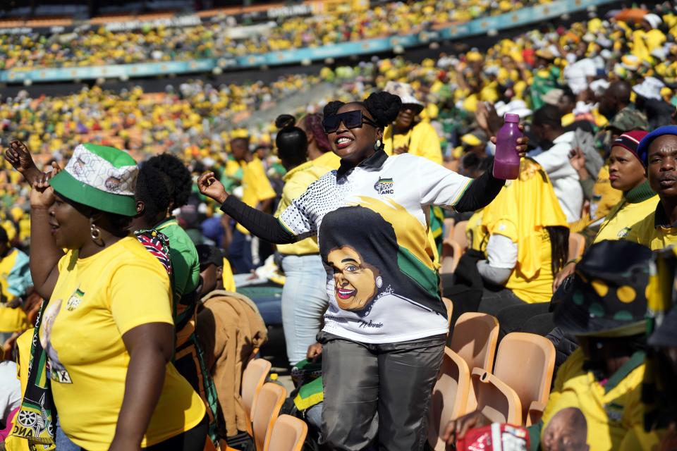 African National Congress supporters wait for South African President Cyril Ramaphosa to arrive at the Siyanqoba rally at FNB stadium in Johannesburg, South Africa, Saturday, May 25, 2024. South African will vote in the 2024 general elections on May 29. (AP Photo/Jerome Delay)