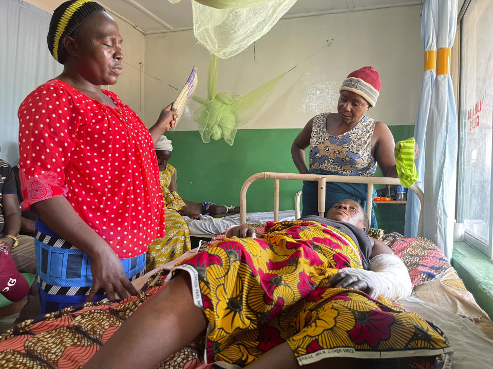 Asabe Philip, 45, lays in Kunji hospital in Southern Kaduna, Nigeria, Thursday , April 27, 2023. Philip was severely burned and lost two of her three children in a late March 2023 gunmen attack that left 33 people dead. (AP Photo/Chinedu Asadu)