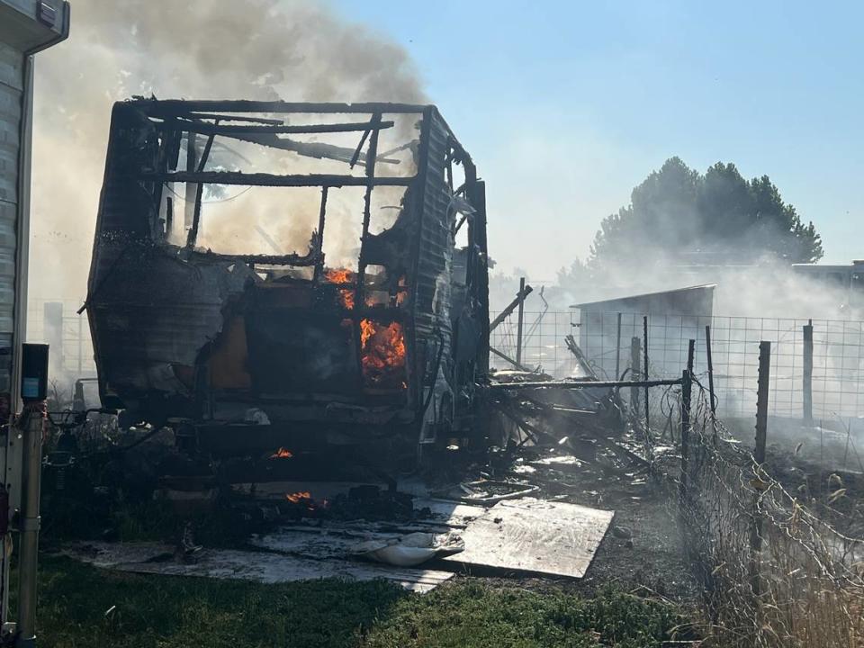 A fire started in a travel trailer on Pidcock Road on Sunday afternoon, and spread to grass and a nearby shed. Courtesy Benton County Fire District 1