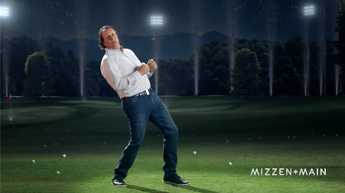 Golfer Phil Mickelson dances and dodges golf balls in a Mizzen + Main ad. (Screenshot from Mizzen + Main ad)