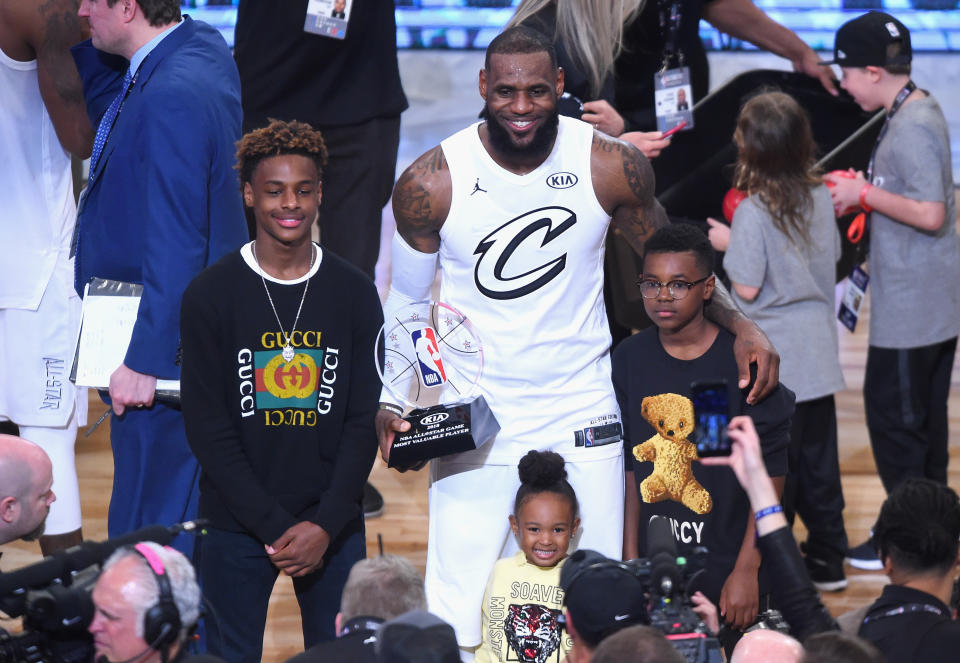 LeBron James Jr. (left) poses with his dad LeBron James, his sister Zhuri James, and his brother Bryce Maximus James after the 2018 NBA All-Star Game at Staples Center in Los Angeles. (Jayne Kamin-Oncea/Getty Images)