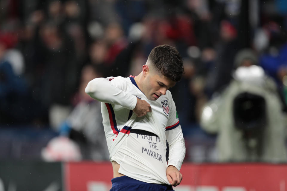 Christian Pulisic delivers a message after scoring a goal during the USMNT's victory over Mexico. (Photo by John Dorton/ISI Photos/Getty Images)