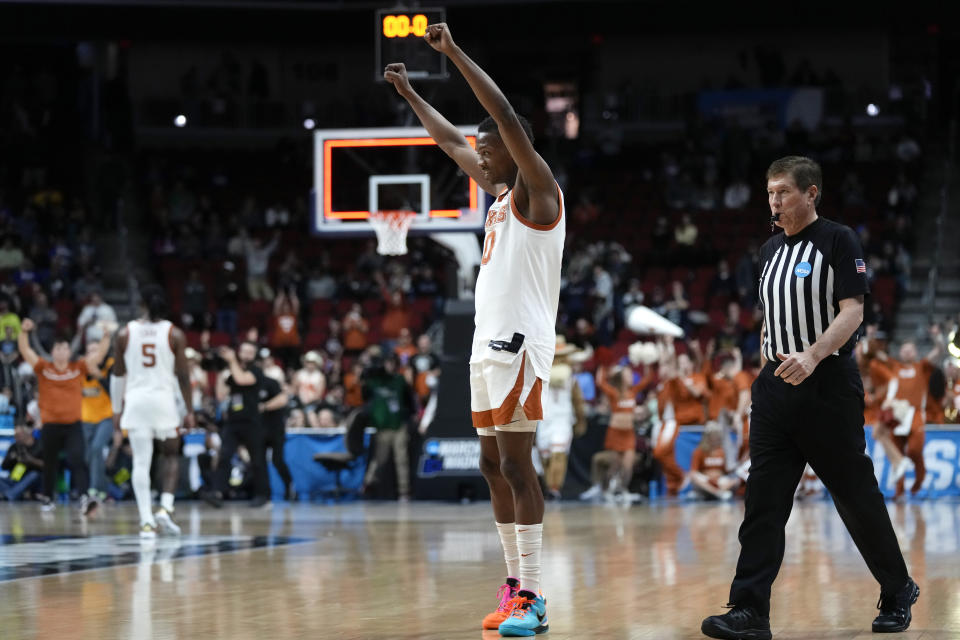 Texas guard Sir'Jabari Rice (10) celebrates at the end of a second-round college basketball game against Penn State in the NCAA Tournament, Saturday, March 18, 2023, in Des Moines, Iowa. (AP Photo/Charlie Neibergall)