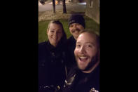 This photo released by the Aurora Police Department, in Colorado, shows Officers Erica Marrero, from left, Jaron Jones and Kyle Dittrich. Jason Rosenblatt, one of three white officers who stopped Elijah McClain, has been fired over the photos showing colleagues reenacting the chokehold used before the Black man died in August 2019, according to documents from prosecutors. The officers shown in the photo have either been fired or have resigned, according to officials. (Aurora Police Department via AP)