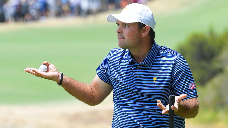 Patrick Reed of the United States team provokes the gallery after making his putt on the 11th green during the second round foursome matches of the Presidents Cup at The Royal Melbourne Golf Club on December 13, 2019, in Victoria , Australia. (Photo by Stan Badz/PGA TOUR via Getty Images)