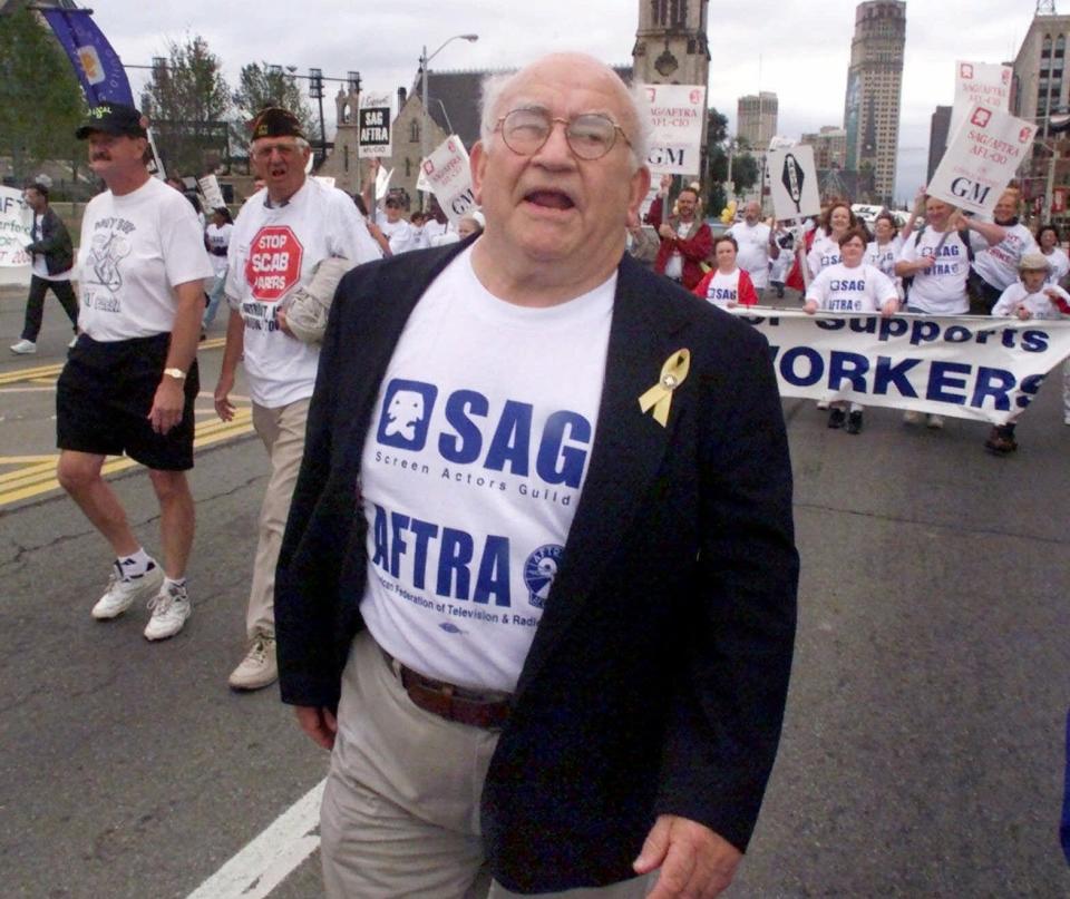 Ed Asner walks with thousands of others in Detroit's Labor Day parade on Sept. 4, 2000. Asner served two terms as president of the Screen Actors Guild.