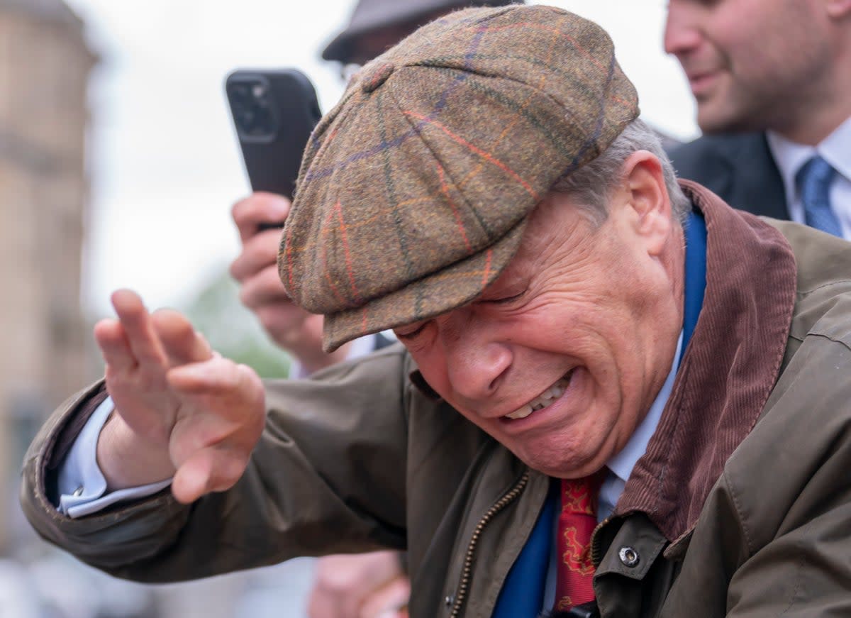 Nigel Farage was on his campaign bus when the objects were thrown towards him   (Danny Lawson/PA Wire)