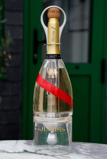 In space, the two-chamber Mumm bottles will eject spheres of champagne foam which can be scooped up in specially made glasses