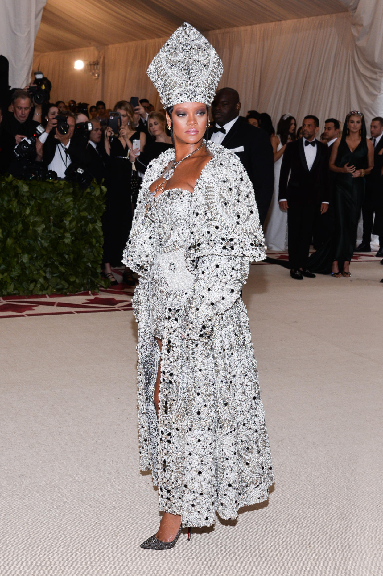 Rihanna walking the red carpet at The Metropolitan Museum of Art Costume Institute Benefit celebrating the opening of Heavenly Bodies : Fashion and the Catholic Imagination held at The Metropolitan Museum of Art in New York, NY, on May 7, 2018. (Photo by Anthony Behar/Sipa USA)