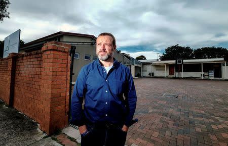 Australian journalist Dean Yates poses for a photograph outside the Elsedeaq Heidelberg Mosque, located in the Melbourne suburb of Heidelberg in Australia, March 2, 2018. Picture taken March 2, 2018. REUTERS/Luis Enrique Ascui