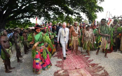 Prince Charles visited the Chief's Nakamal, a traditional meeting place on the island - Credit: Tim Rooke/REX/Shutterstock