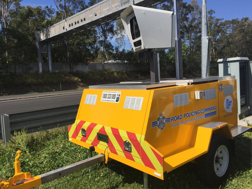 Picture of a mobile speed camera being used on the road in Queensland.