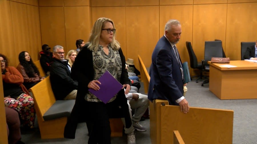 Polk County school board member Lisa Miller walking up to podium to deliver victim impact statement Thursday in court