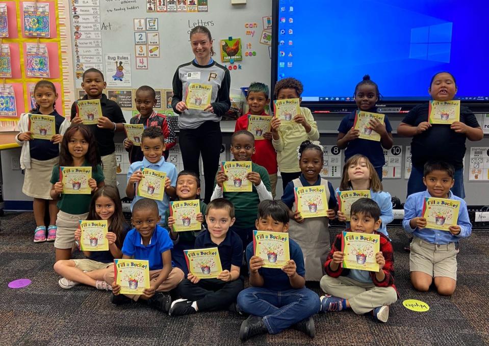 Volunteer Haley Diess of the Pittsburgh Pirates organization leads a Bucket Fillers session with kindergarten students at Ballard Elementary in Bradenton.