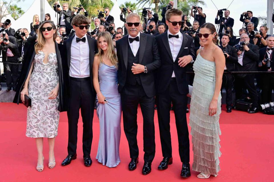 <p>Stephane Cardinale - Corbis/Corbis via Getty</p> Kevin Costner with five of his kids