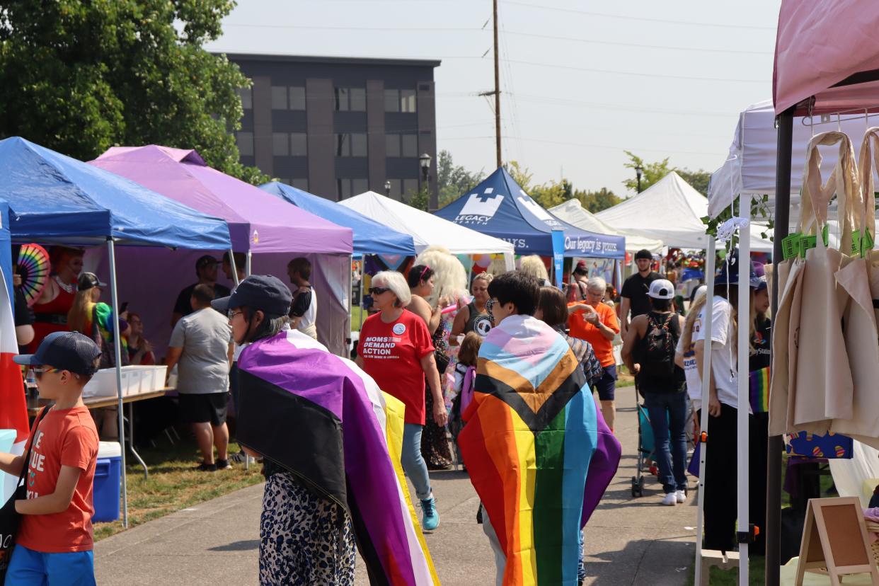 People check out booths at Pride in the Park at Riverfront Park in Salem on Saturday, Aug. 26, 2023.