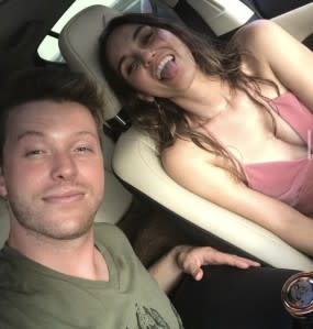 Harrison Wagner and Sophia Bui in car