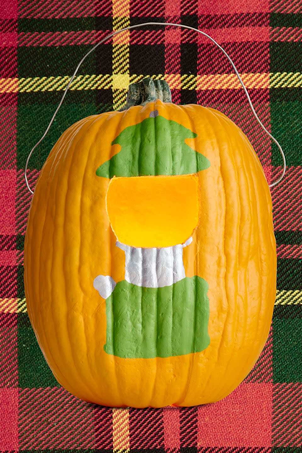 <p>Light up your porch or walkway with this jack-o'-<em>lantern</em>, or get creative and dream up your own designs.<br></p><p><strong><a href="https://www.countryliving.com/diy-crafts/g1350/pumpkin-decorating-1009/" rel="nofollow noopener" target="_blank" data-ylk="slk:Get the tutorial;elm:context_link;itc:0;sec:content-canvas" class="link ">Get the tutorial</a>.</strong> </p>