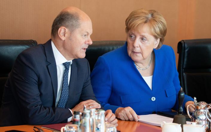 scholz merkel - Omer Messinger/Getty Images