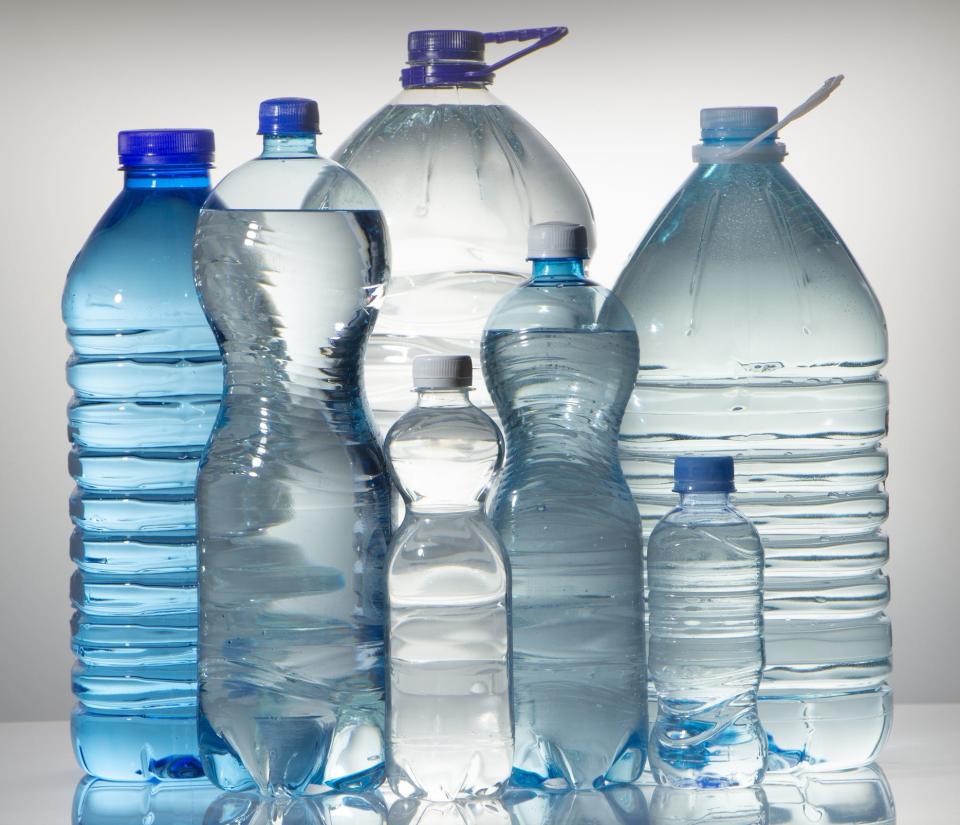 Different sized plastic water bottles.