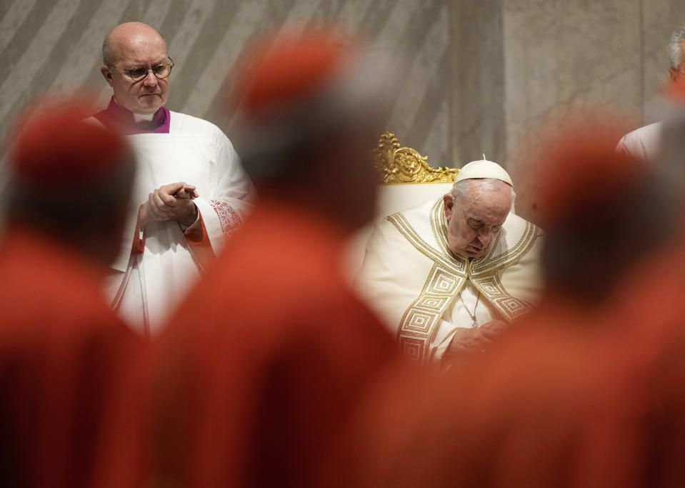 Pope Francis presides over the first Vespers and the 'Te Deum' in St. Peter's Basilica Saturday, Dec. 31, 2022. Pope Emeritus Benedict XVI, the German theologian who will be remembered as the first pope in 600 years to resign, has died, the Vatican announced Saturday. He was 95. (AP Photo/Andrew Medichini)