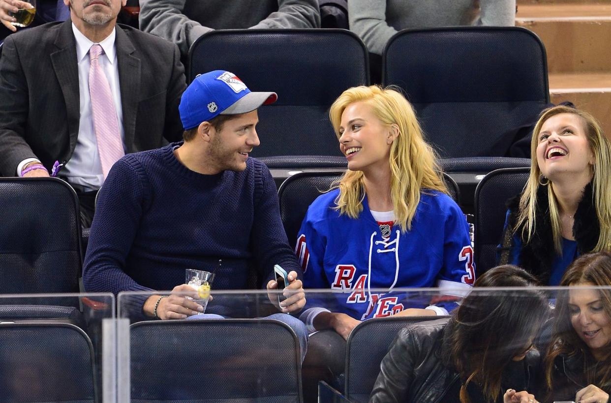 new york, ny november 19 tom ackerley and margot robbie attend the philadelphia flyers vs new york rangers game at madison square garden on november 19, 2014 in new york city photo by james devaneygc images