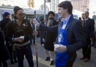 Leader of the Liberal Party of Canada MP Justin Trudeau talks to people in the downtown eastside neighbourhood in Vancouver, British Columbia December 18, 2013. REUTERS/Ben Nelms (CANADA - Tags: POLITICS)