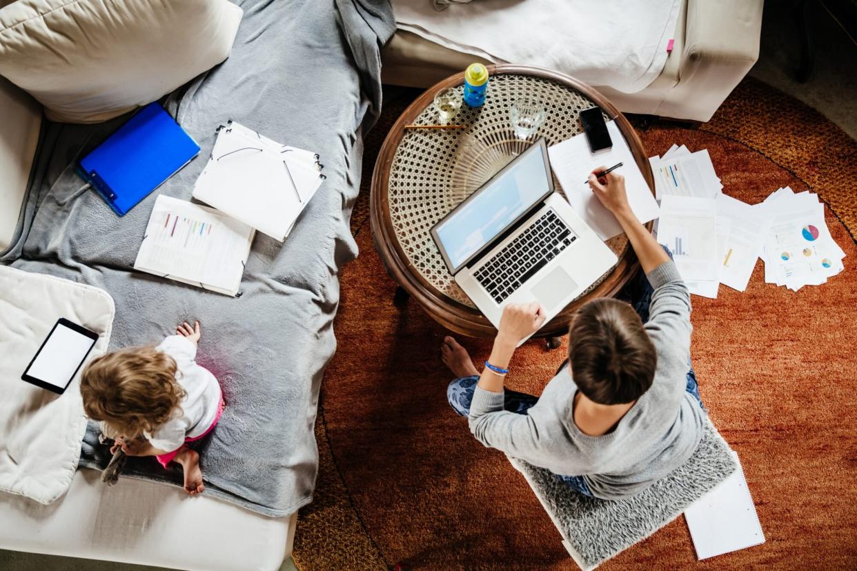 An image of a mom working.