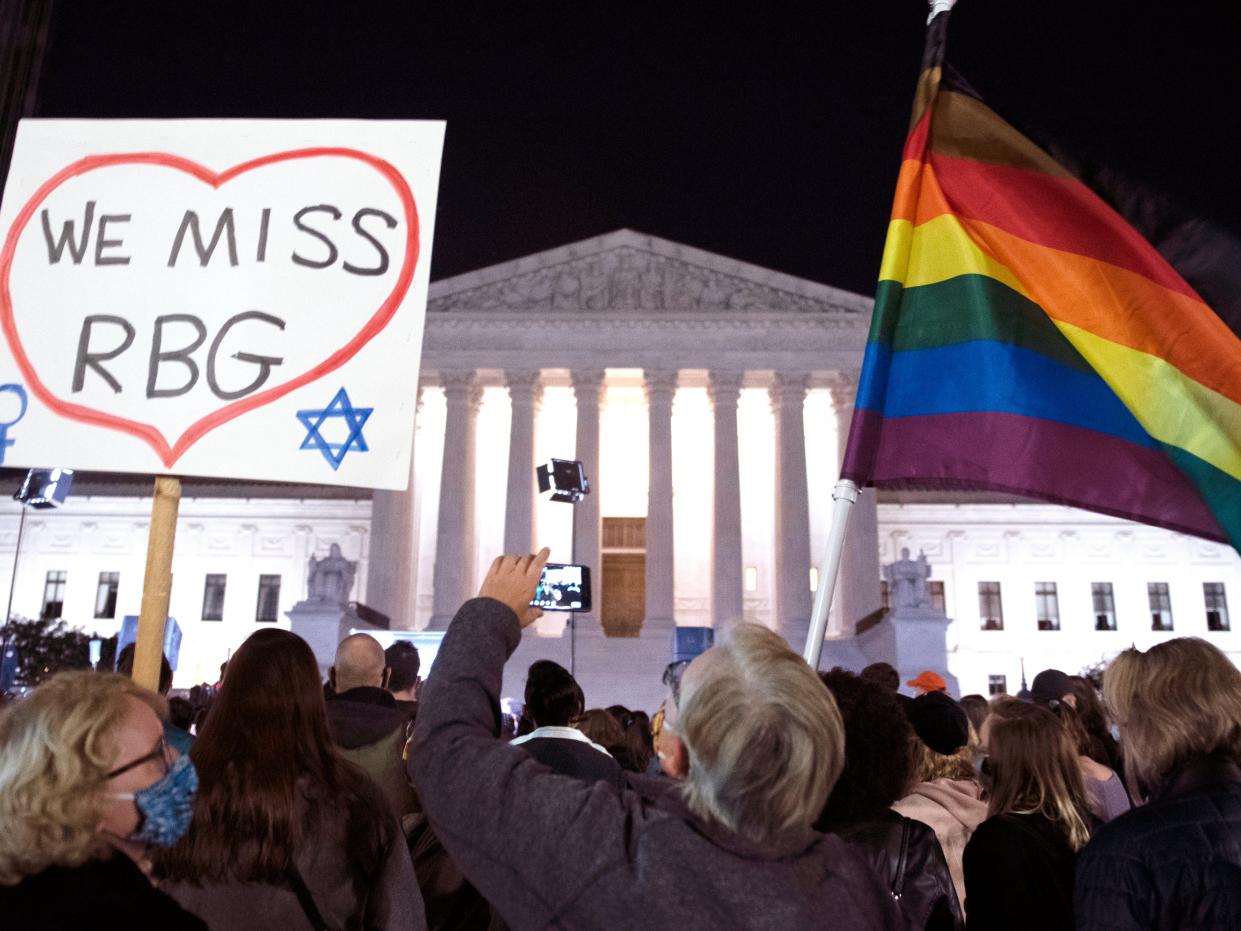 People gathered at the Supreme Court building in Washington on Friday night after the death of Justice Ruth Bader Ginsburg. (Copyright 2020 the Associated Press. All Rights Reserved.)