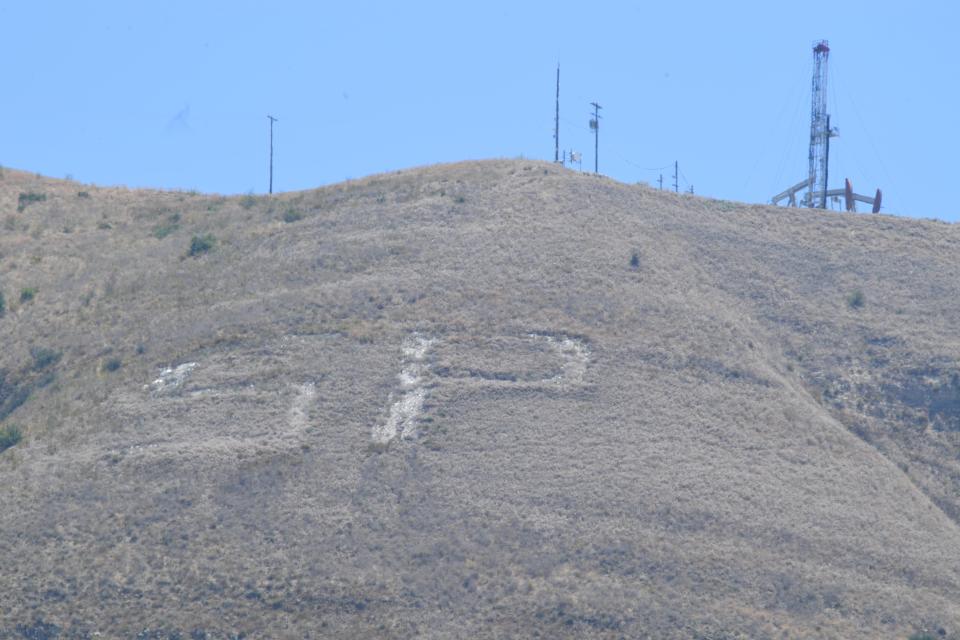 Santa Paula's faded "SP" monogram on July 11, prior to the restoration.