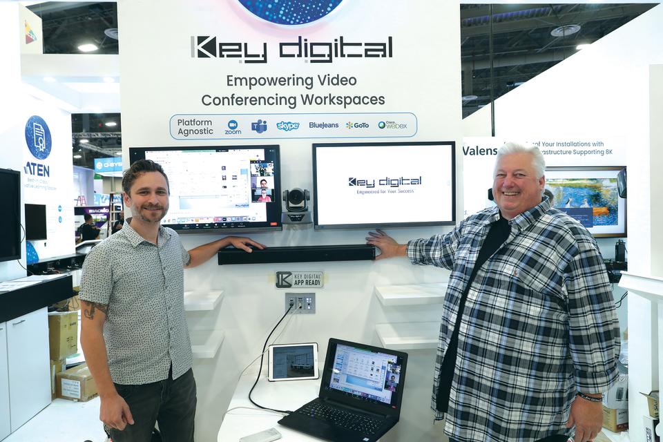 The Key Digital team showcasing conference room in a box at ISE 2024.