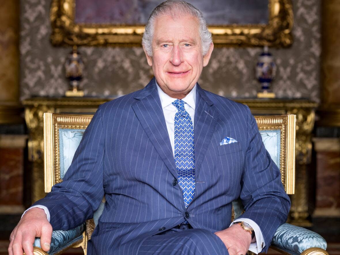 King Charles III photographed in the Blue Drawing Room at Buckingham Palace. People from around the world will be watching Saturday's coronation. (Hugo Burnand/Royal Household 2023/Handout/Reuters - image credit)