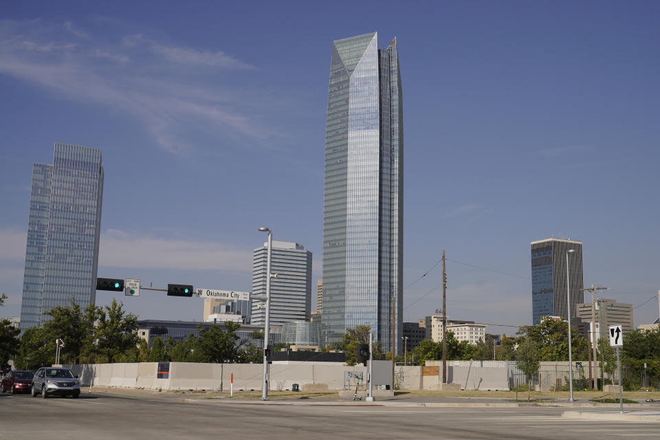 The Devon Energy Tower is pictured Monday, Sept. 27, 2021, in Oklahoma City. Oklahoma City-based Devon Energy Corporation has agreed to a $6.15 million settlement agreement with the federal government over allegations it underpaid royalties on federal leases, the U.S. Department of Justice announced Monday. (AP Photo/Sue Ogrocki)