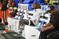 Cincinnati Bengals wide receiver Tee Higgins (85) sits on the bench during the second half of an NFL football game against the Cleveland Browns in Cleveland, Monday, Oct. 31, 2022. (AP Photo/David Richard)