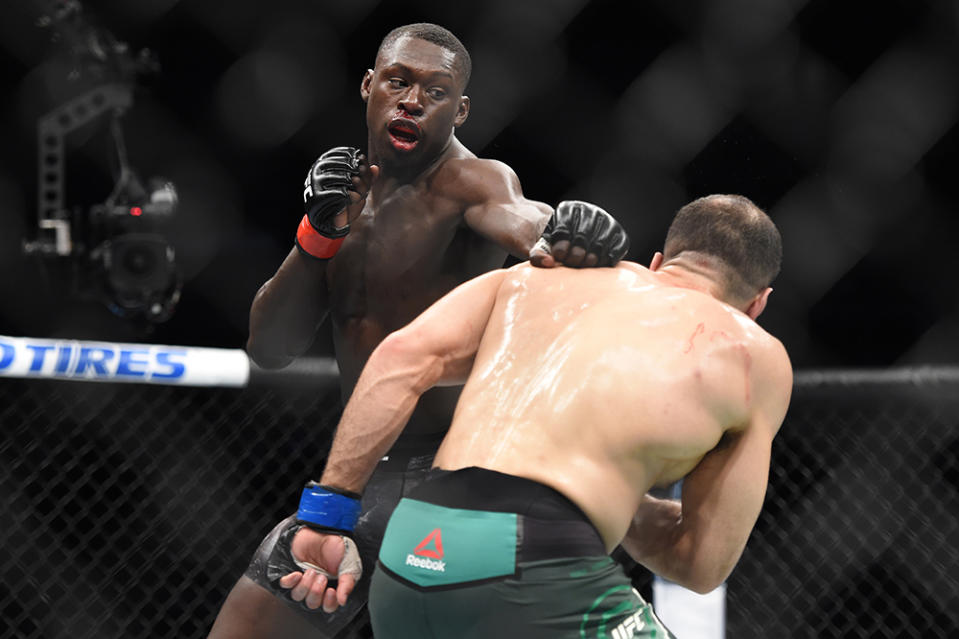 Apr 13, 2019; Atlanta, GA, USA; Curtis Millender (red gloves) fights Belal Muhammad (blue gloves) during UFC 236 at State Farm Arena. Mandatory Credit: John David Mercer-USA TODAY Sports