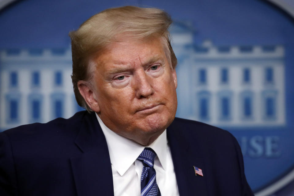 President Donald Trump listens during a briefing about the coronavirus in the James Brady Press Briefing Room of the White House, Tuesday, April 21, 2020, in Washington. (AP Photo/Alex Brandon)