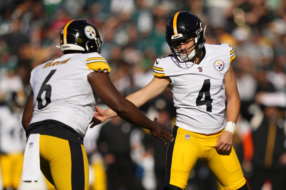 Pittsburgh Steelers kicker Nick Shiba (4) is congratulated by Pressley Harvin III after kicking a 29-yard field goal during the second half of an NFL football game between the Pittsburgh Steelers and Philadelphia Eagles, Sunday, Oct. 30, 2022, in Philadelphia. (AP Photo/Matt Slocum)