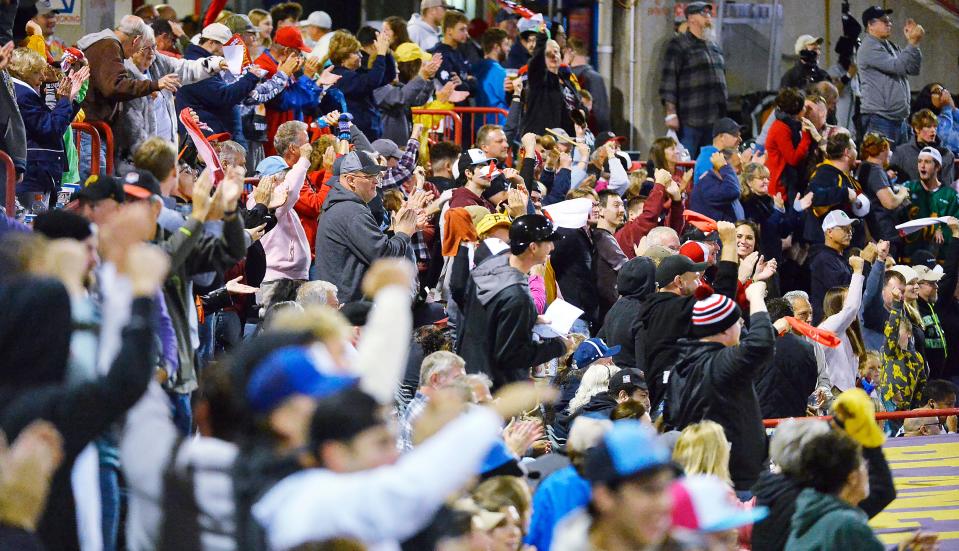 Erie SeaWolves fans cheer the go-ahead run in the seventh inning of Game 1 of the Eastern League Championship Series Saturday night. Erie won 6-5.