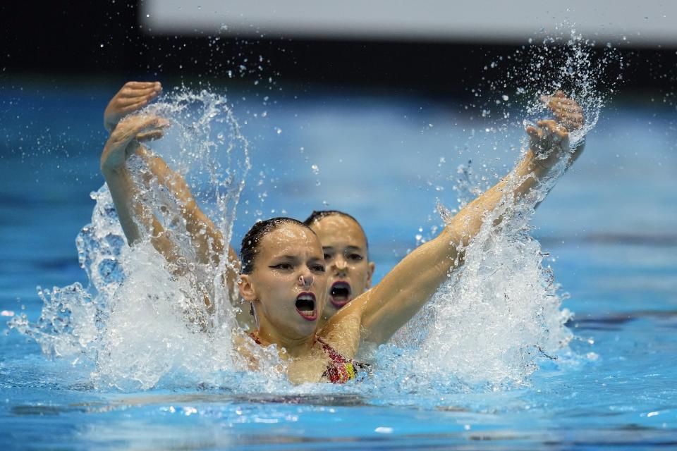 Blanka Barbocz and Angelika Bastianelli, of Hungary, compete in the women's duet technical of artistic swimming at the World Swimming Championships in Fukuoka, Japan, Friday, July 14, 2023. (AP Photo/Nick Didlick)