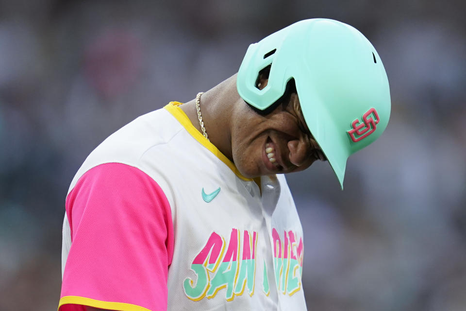 San Diego Padres' Juan Soto reacts after being hit by a pitch while batting during the third inning of a baseball game against the Arizona Diamondbacks, Wednesday, Sept. 7, 2022, in San Diego. (AP Photo/Gregory Bull)